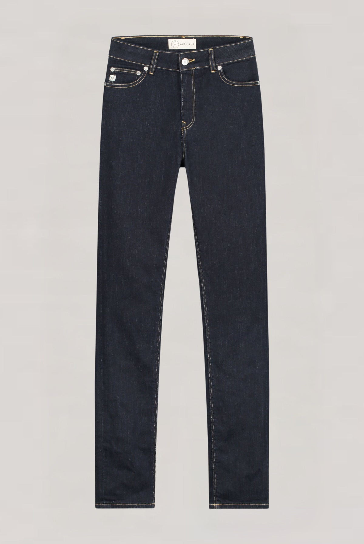 Dark indigo slim-fit jeans with exposed button closure, featuring classic five-pocket design and contrast stitching.
